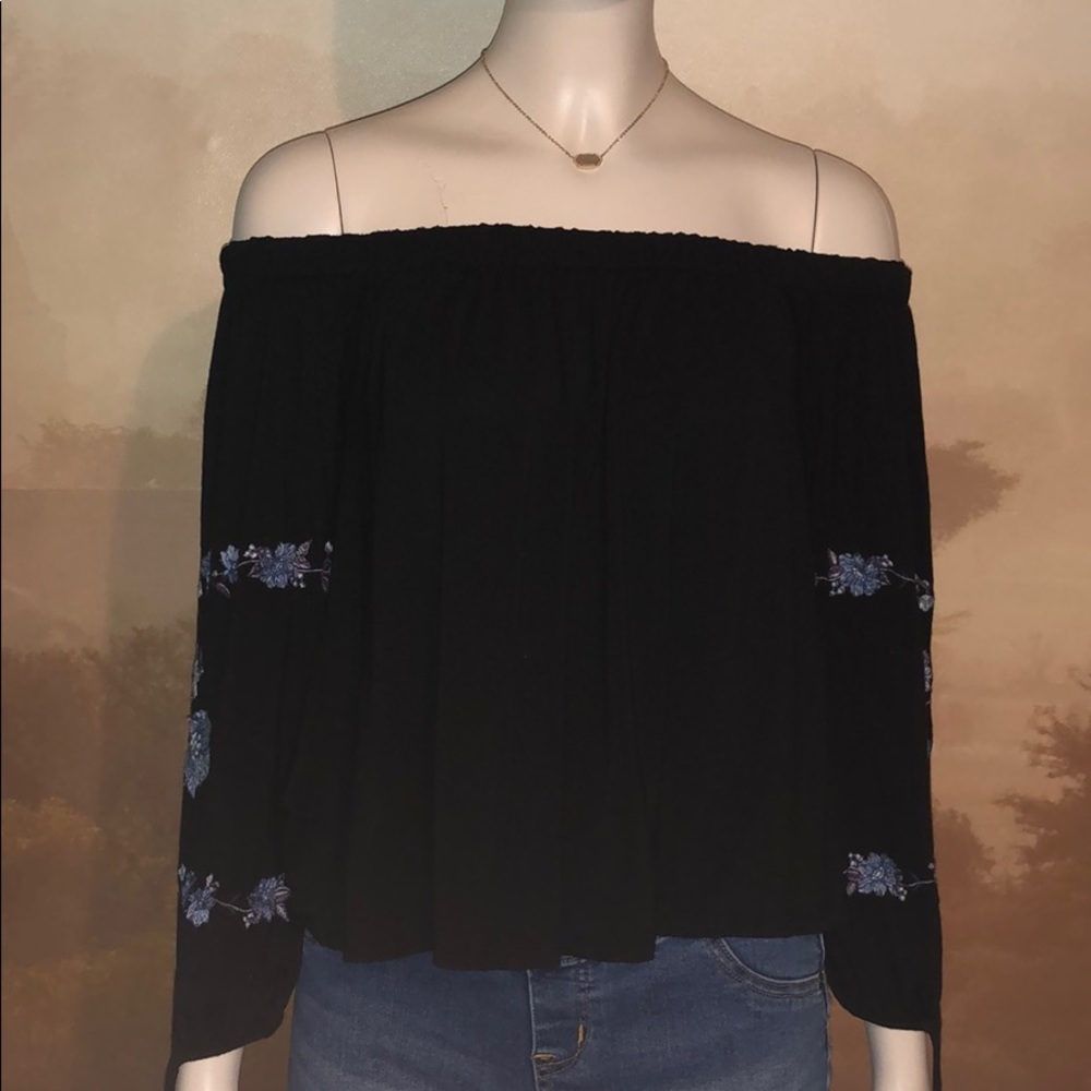Black off the shoulders tee. shorts not included